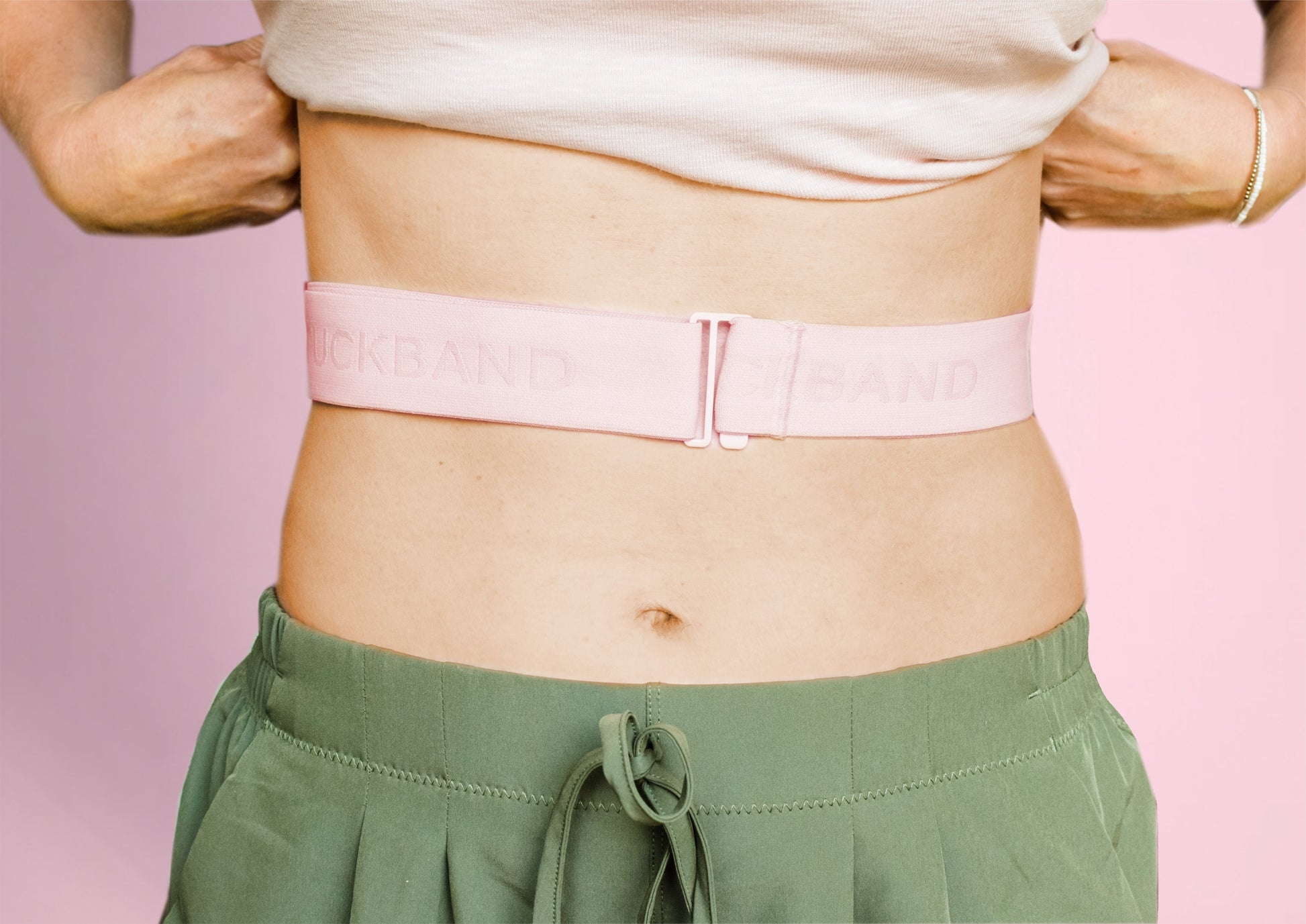 Tuckband worn with white t-shirt showing cropped styling effect